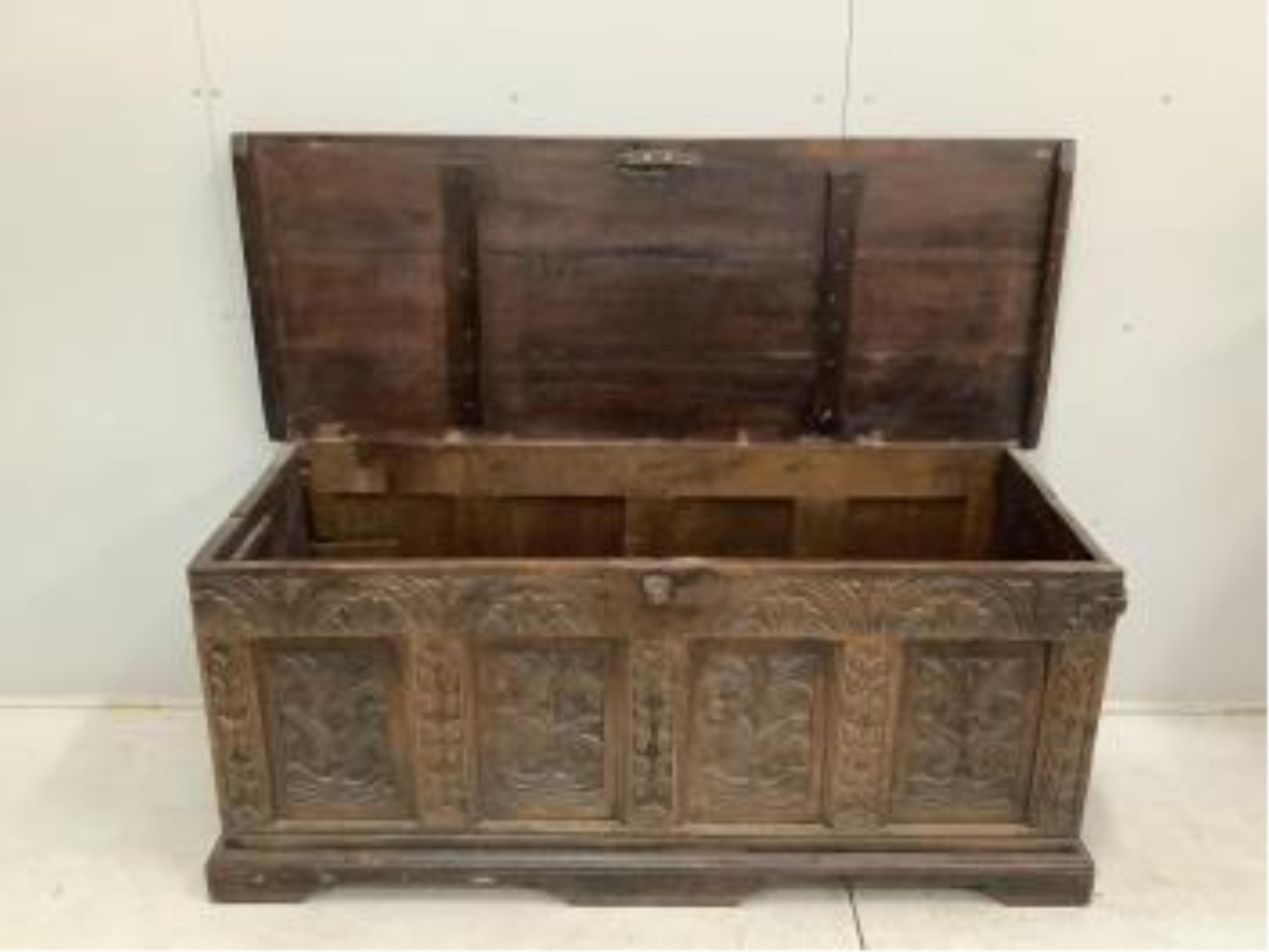 A 17th century and later strapwork carved oak coffer, width 160cm, depth 61cm, height 70cm. Condition - poor to fair